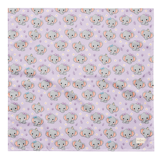 Tiny Tusks dog bandana featuring elephant faces and paw prints on a lavender background by HoneyPaw Pets