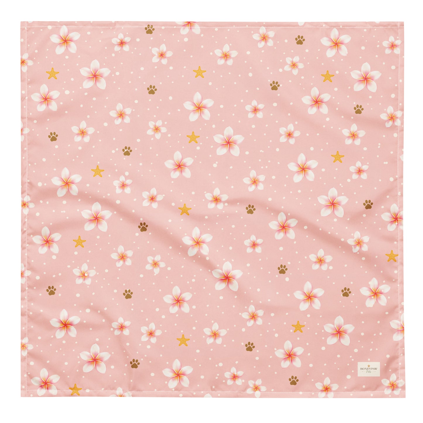 Aloha Paws dog bandana featuring pink plumeria flowers, paw prints, and golden stars on a blush pink background by HoneyPaw Pets.