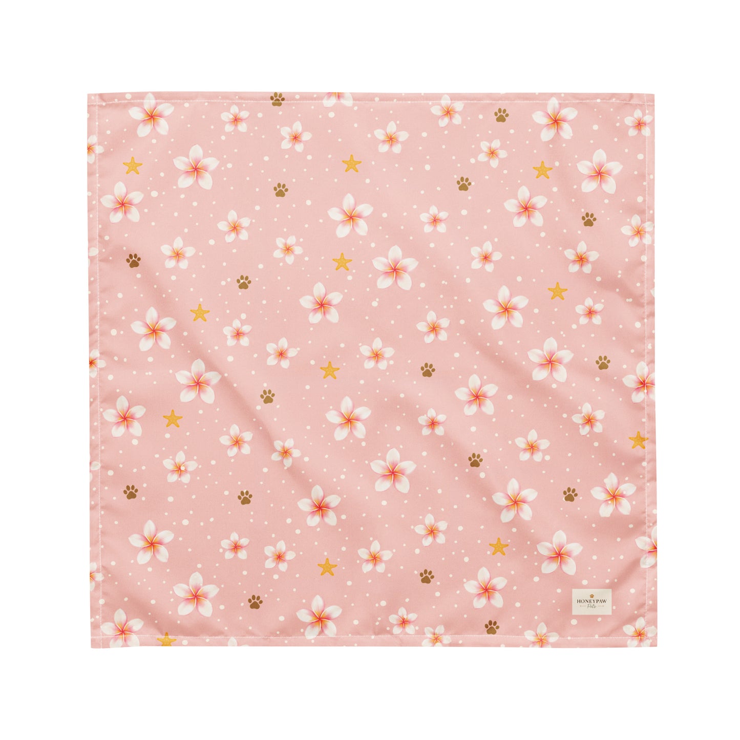 Aloha Paws dog bandana featuring pink plumeria flowers, paw prints, and golden stars on a blush pink background by HoneyPaw Pets.