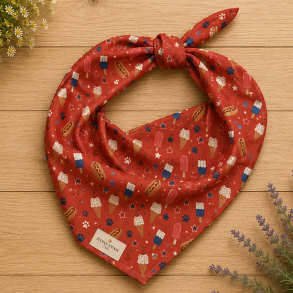 Backyard Bark-B-Q dog bandana featuring hot dogs, popsicles, and ice cream treats on a red background by HoneyPaw Pets.
