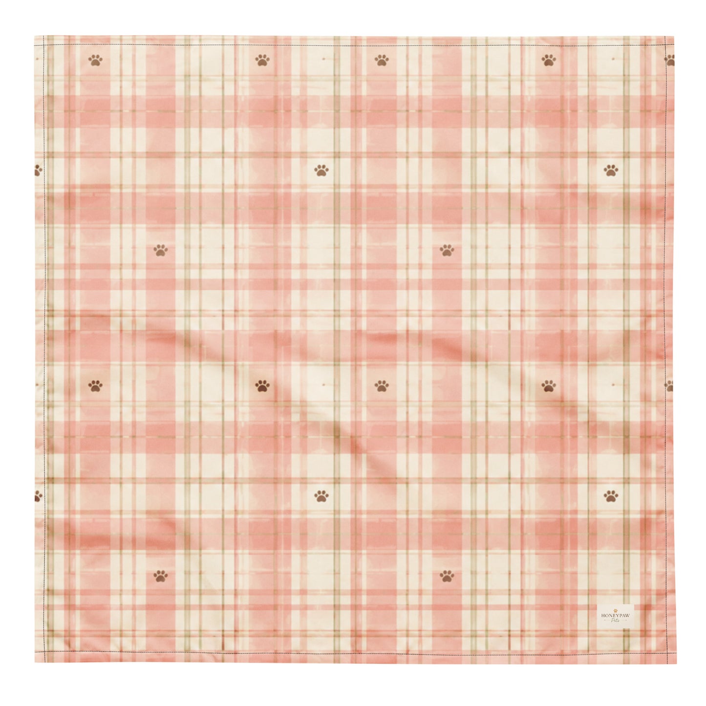 Berry Patch dog bandana featuring a soft blush pink and cream plaid pattern with paw prints by HoneyPaw Pets.