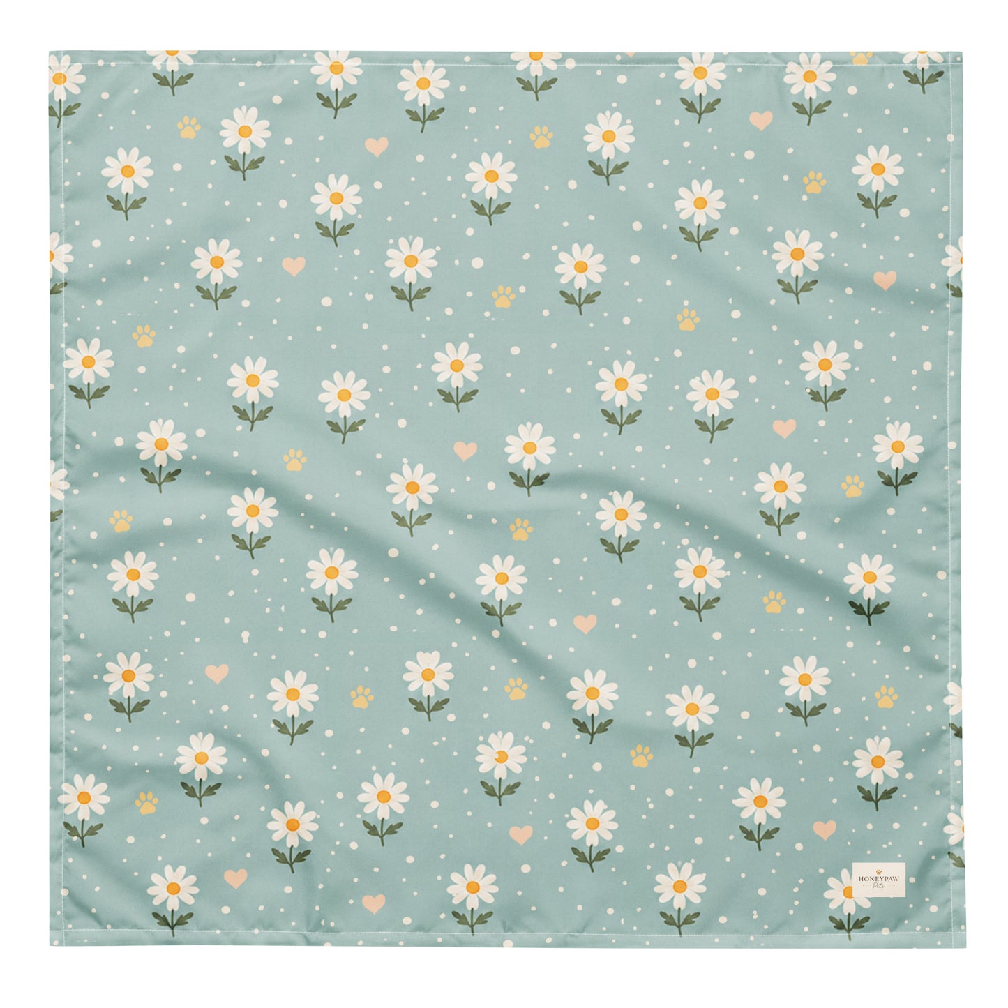 Blue Bumble dog bandana featuring white daisies, paw prints, and golden hearts on a soft blue background by HoneyPaw Pets.