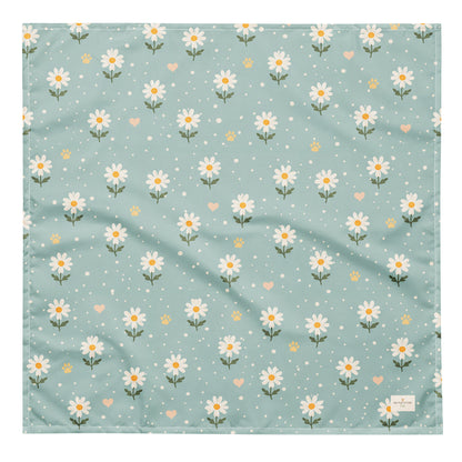 Blue Bumble dog bandana featuring white daisies, paw prints, and golden hearts on a soft blue background by HoneyPaw Pets.
