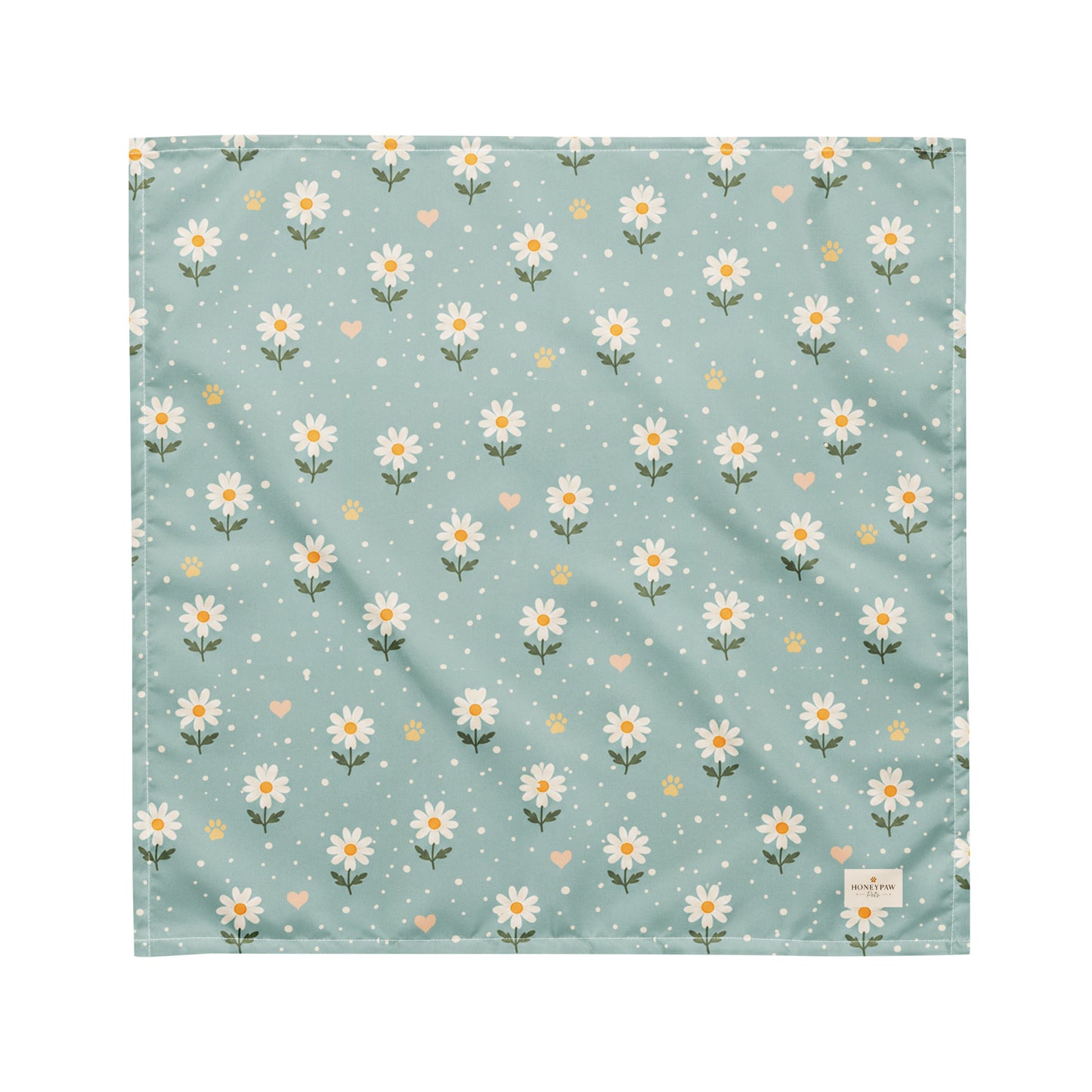 Blue Bumble dog bandana featuring white daisies, paw prints, and golden hearts on a soft blue background by HoneyPaw Pets.
