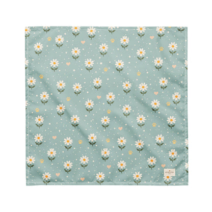 Blue Bumble dog bandana featuring white daisies, paw prints, and golden hearts on a soft blue background by HoneyPaw Pets.