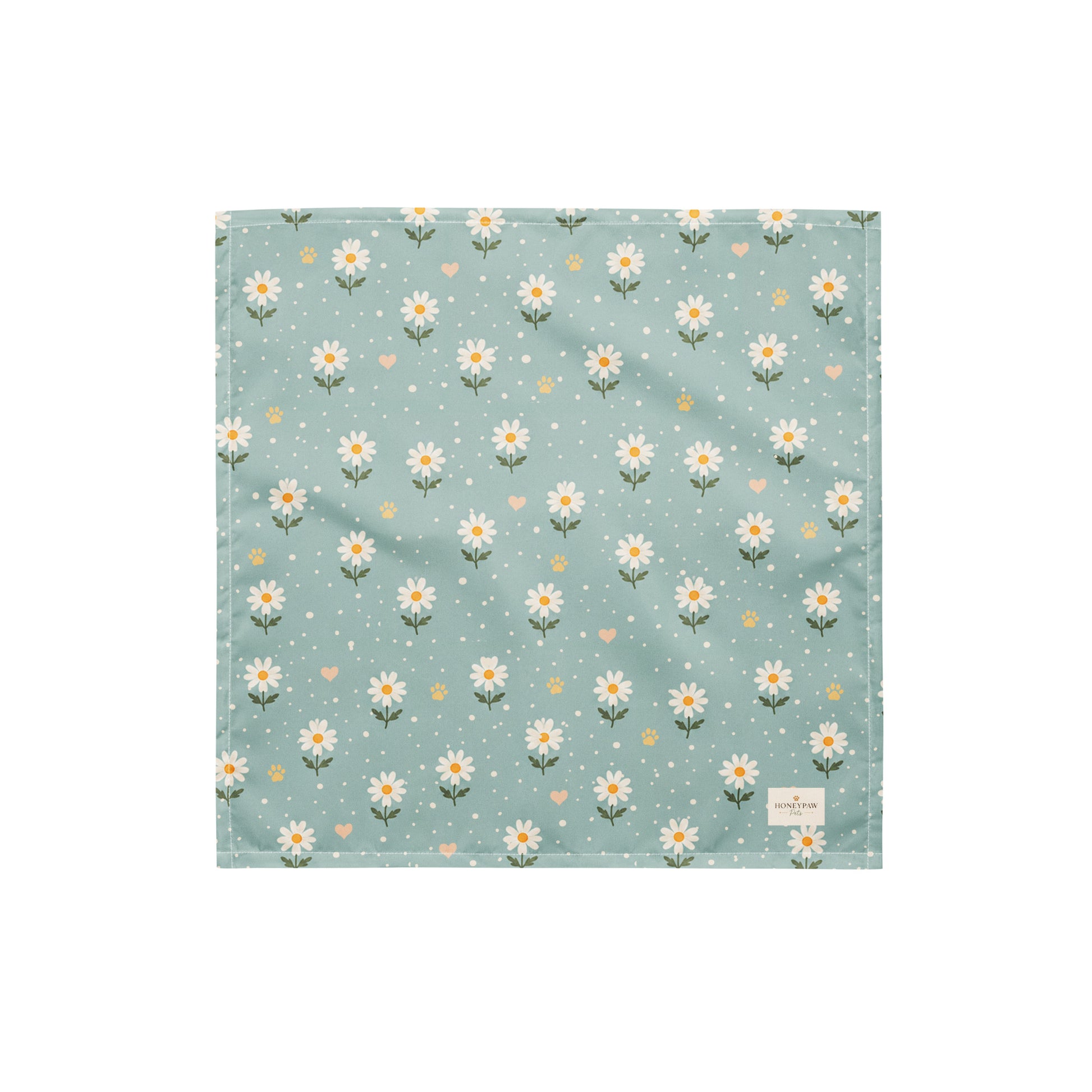 Blue Bumble dog bandana featuring white daisies, paw prints, and golden hearts on a soft blue background by HoneyPaw Pets.