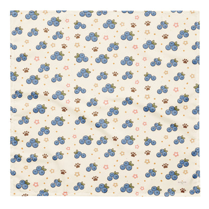 Blueberry Barkin' dog bandana featuring fresh blueberries, floral accents, and paw prints on a cream background by HoneyPaw Pets.