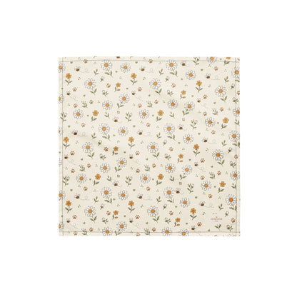 Bumble Bloom dog bandana featuring a cream background with daisy flowers, wildflower accents, and honey bees by HoneyPaw Pets.