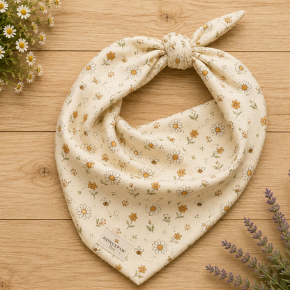 Bumble Bloom dog bandana featuring a cream background with daisy flowers, wildflower accents, and honey bees by HoneyPaw Pets.