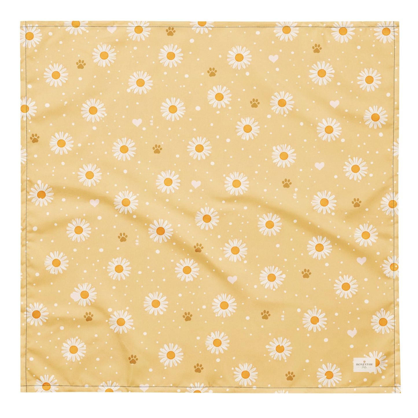 Butter Scout dog bandana featuring white daisy flowers, golden paw prints, and tiny hearts on a buttery yellow background by HoneyPaw Pets.