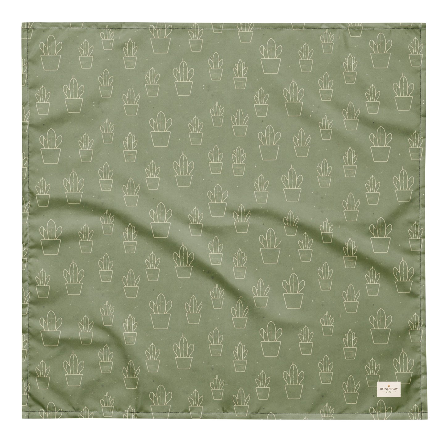 Cactus Cruise dog bandana featuring a sage green background with an all-over cactus pattern by HoneyPaw Pets.