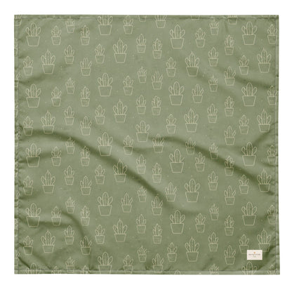 Cactus Cruise dog bandana featuring a sage green background with an all-over cactus pattern by HoneyPaw Pets.