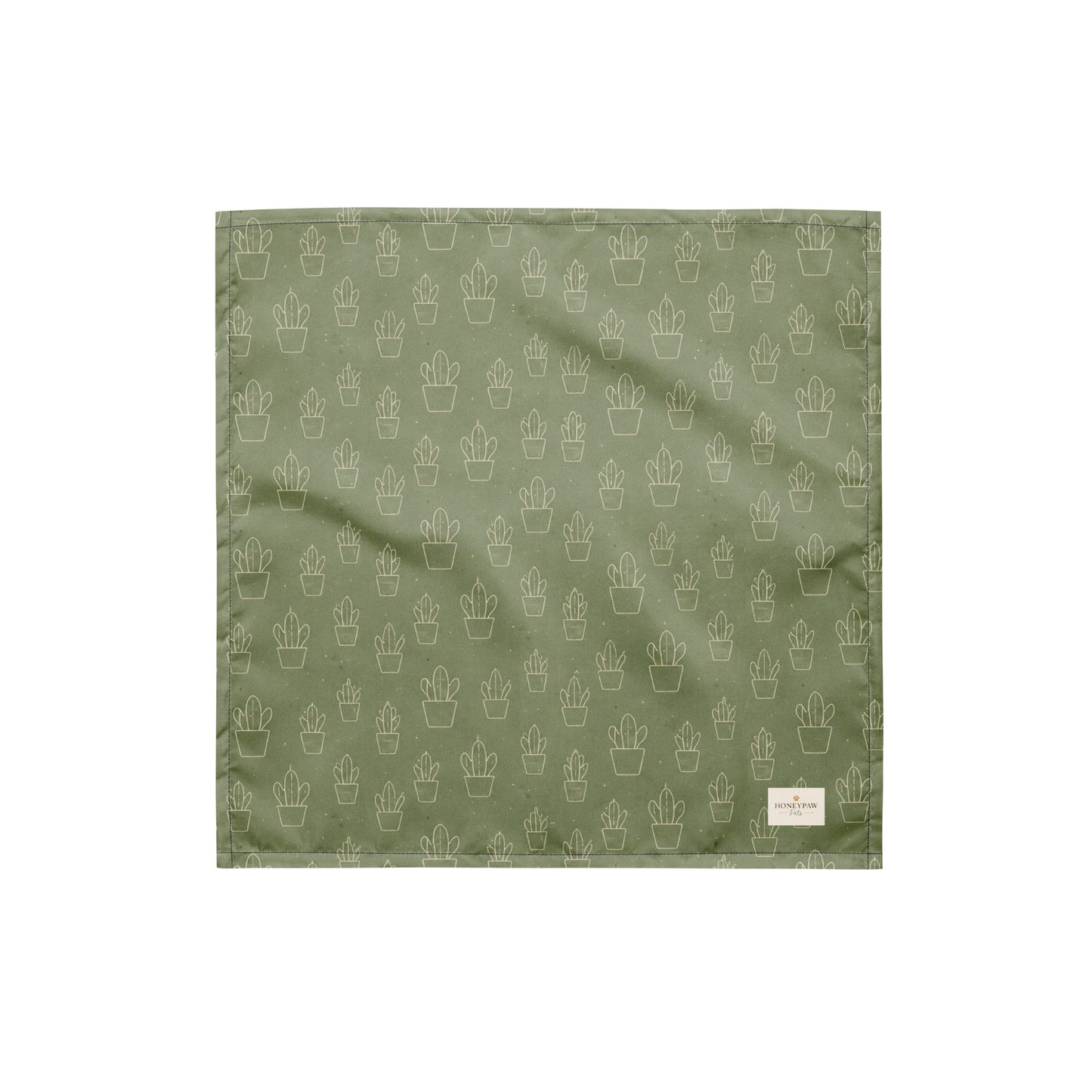 Cactus Cruise dog bandana featuring a sage green background with an all-over cactus pattern by HoneyPaw Pets.