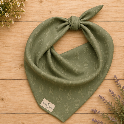 Cactus Cruise dog bandana featuring a sage green background with an all-over cactus pattern by HoneyPaw Pets.