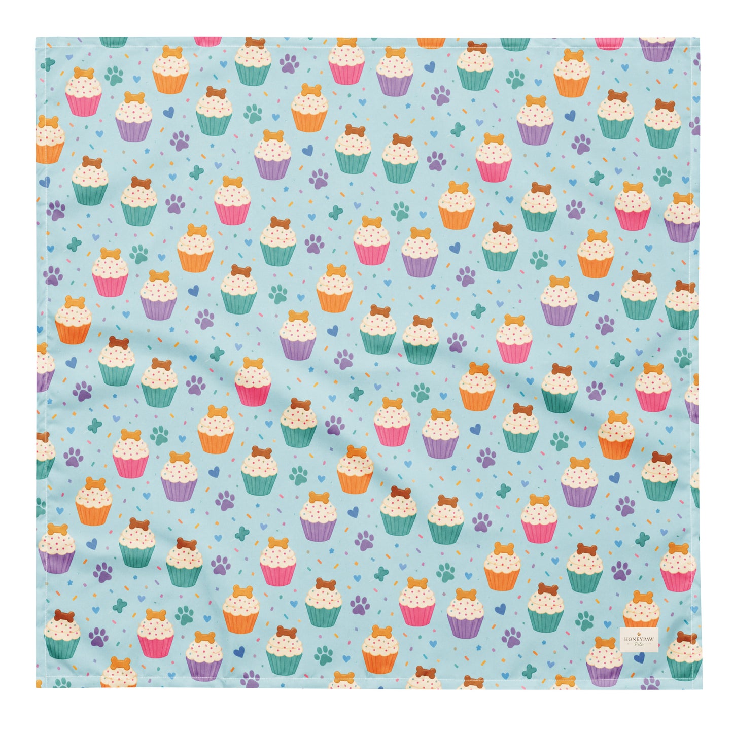 Cookie on Top birthday dog bandana featuring colorful cupcakes, hearts and paw prints on a light blue background by HoneyPaw Pets