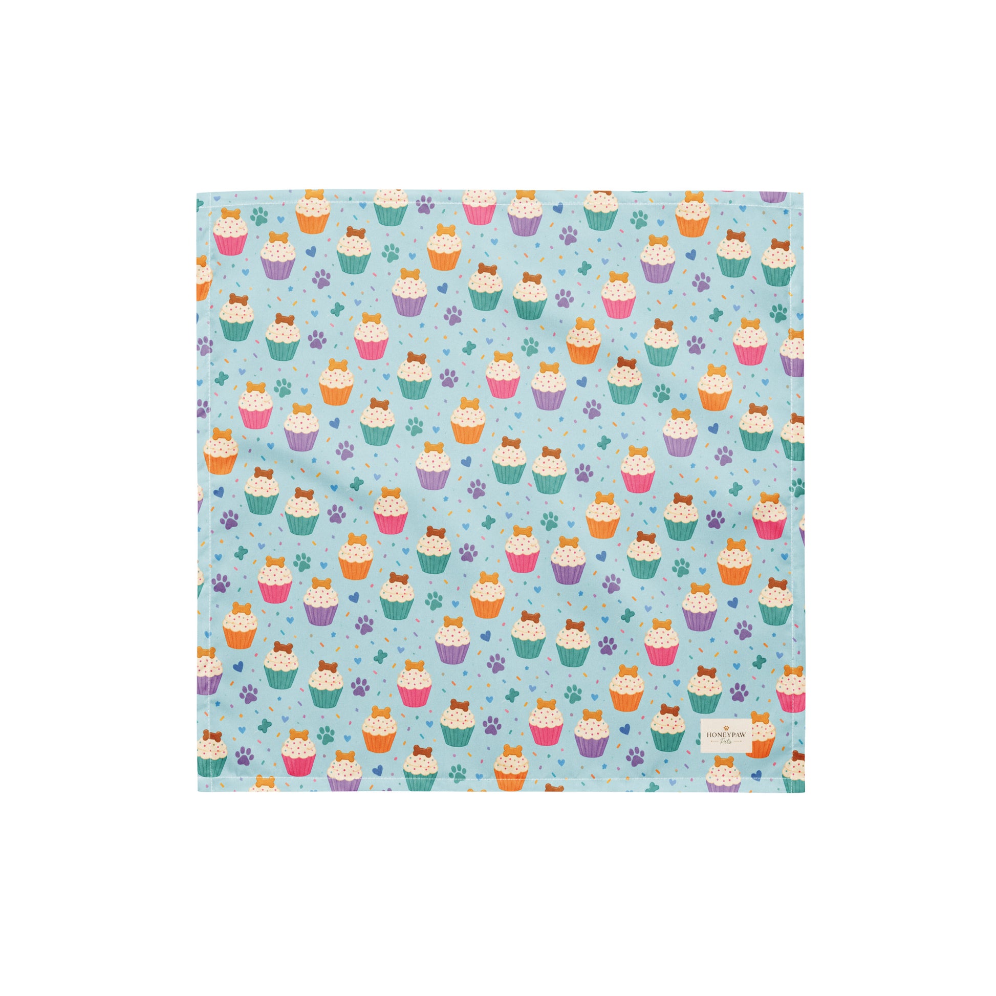 Cookie on Top birthday dog bandana featuring colorful cupcakes, hearts and paw prints on a light blue background by HoneyPaw Pets