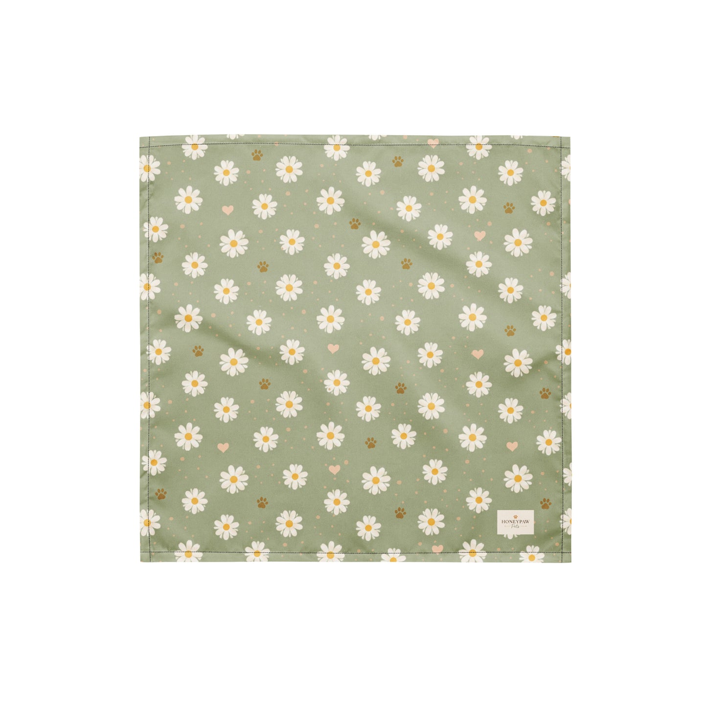 Daisy Dream dog bandana featuring white daisy flowers, golden paw prints, and tiny hearts on a soft sage green background by HoneyPaw Pets.