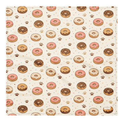 Donut Daydream dog bandana featuring pink and chocolate frosted donuts with paw prints on a cream background by HoneyPaw Pets.