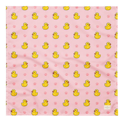 Duckie Dreams dog bandana featuring rubber ducks and paw prints on a pink background by HoneyPaw Pets