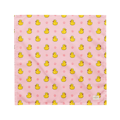 Duckie Dreams dog bandana featuring rubber ducks and paw prints on a pink background by HoneyPaw Pets