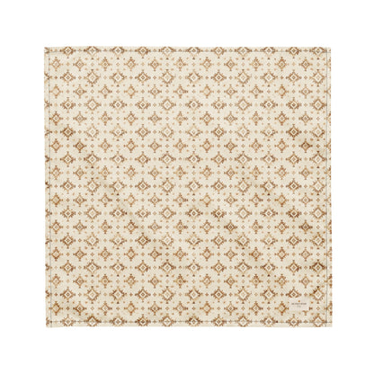 Dusty Paws dog bandana featuring a cream background with a western-inspired geometric pattern in warm tan tones by HoneyPaw Pets.