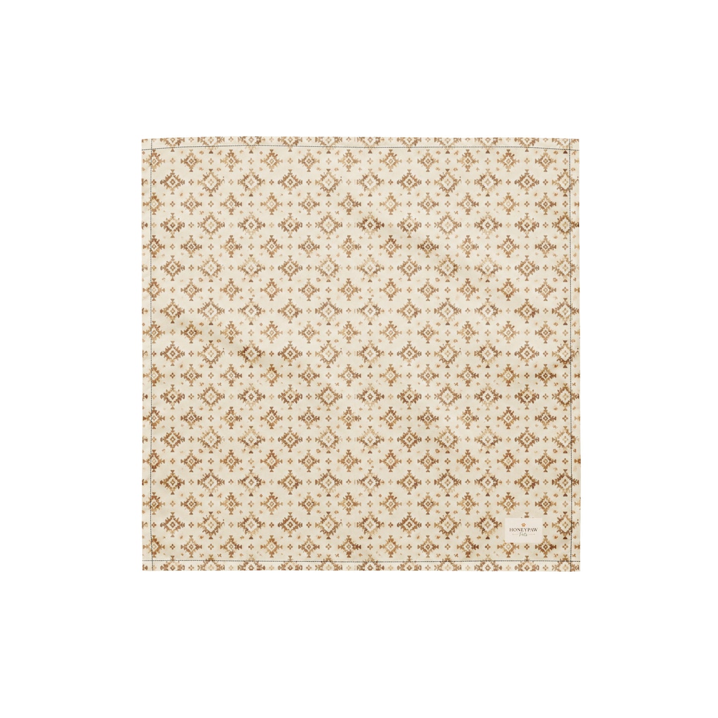 Dusty Paws dog bandana featuring a cream background with a western-inspired geometric pattern in warm tan tones by HoneyPaw Pets.