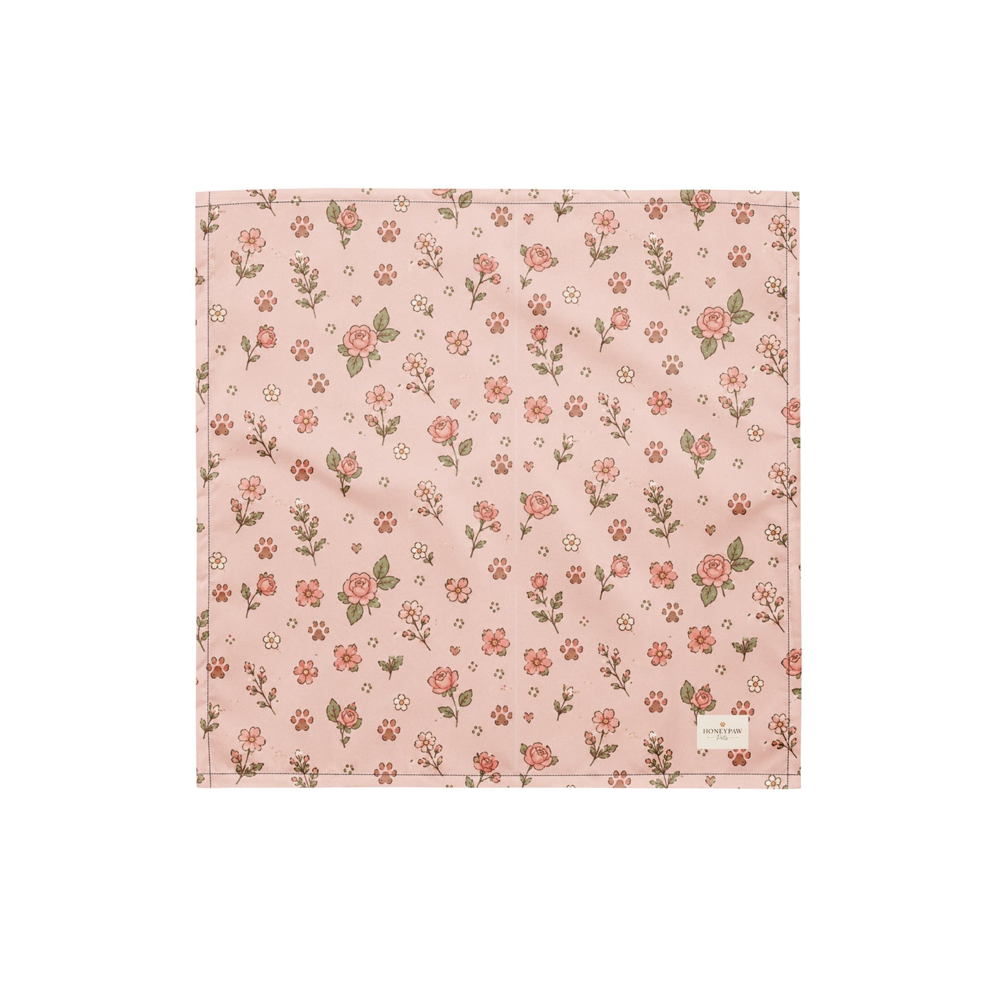 Feeling Rosy dog bandana featuring a blush pink background with delicate rose floral prints and paw print accents by HoneyPaw Pets.