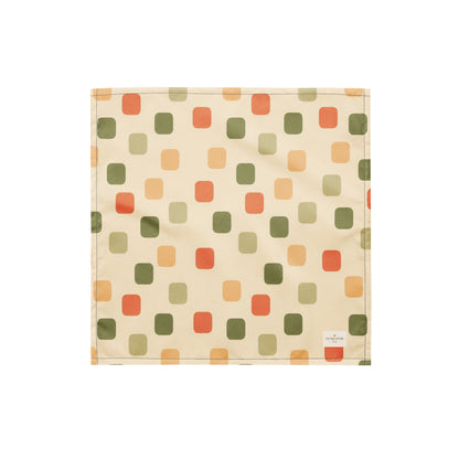 Harvest Tiles dog bandana featuring a cream geometric pattern in sage green, terracotta, and golden yellow by HoneyPaw Pets.