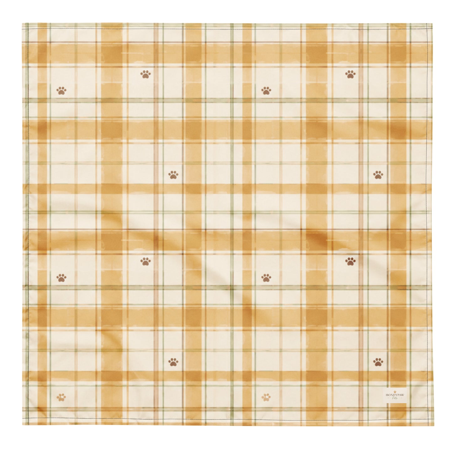 Honey Harvest dog bandana featuring a honey gold and cream plaid pattern with scattered paw prints by HoneyPaw Pets.
