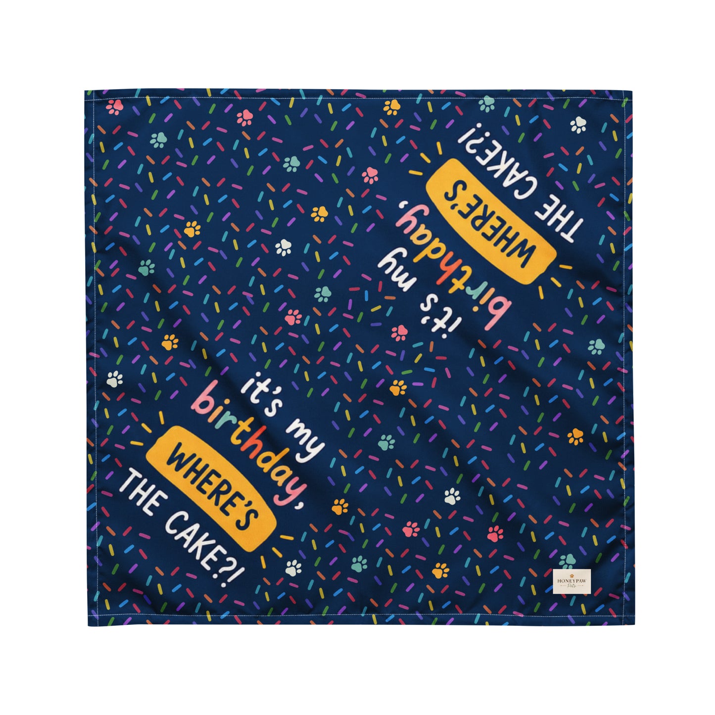 It's My Birthday birthday dog bandana featuring colorful confetti, paw prints, and the phrase "It's My Birthday, Where's the Cake?" on a navy blue background by HoneyPaw Pets