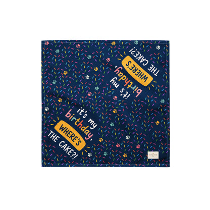 It's My Birthday birthday dog bandana featuring colorful confetti, paw prints, and the phrase "It's My Birthday, Where's the Cake?" on a navy blue background by HoneyPaw Pets