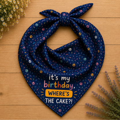 It's My Birthday birthday dog bandana featuring colorful confetti, paw prints, and the phrase "It's My Birthday, Where's the Cake?" on a navy blue background by HoneyPaw Pets