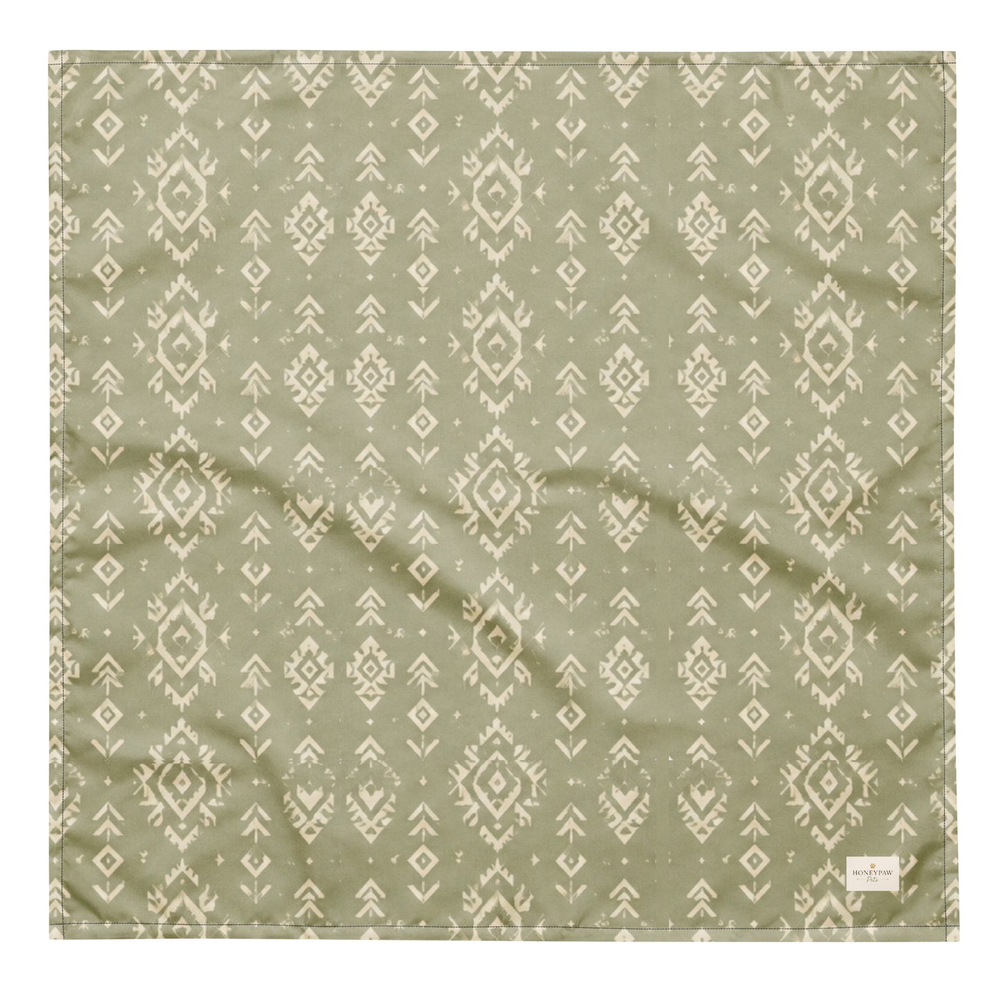 Juniper Trail dog bandana featuring a sage green background with a western-inspired geometric pattern in soft cream tones by HoneyPaw Pets.