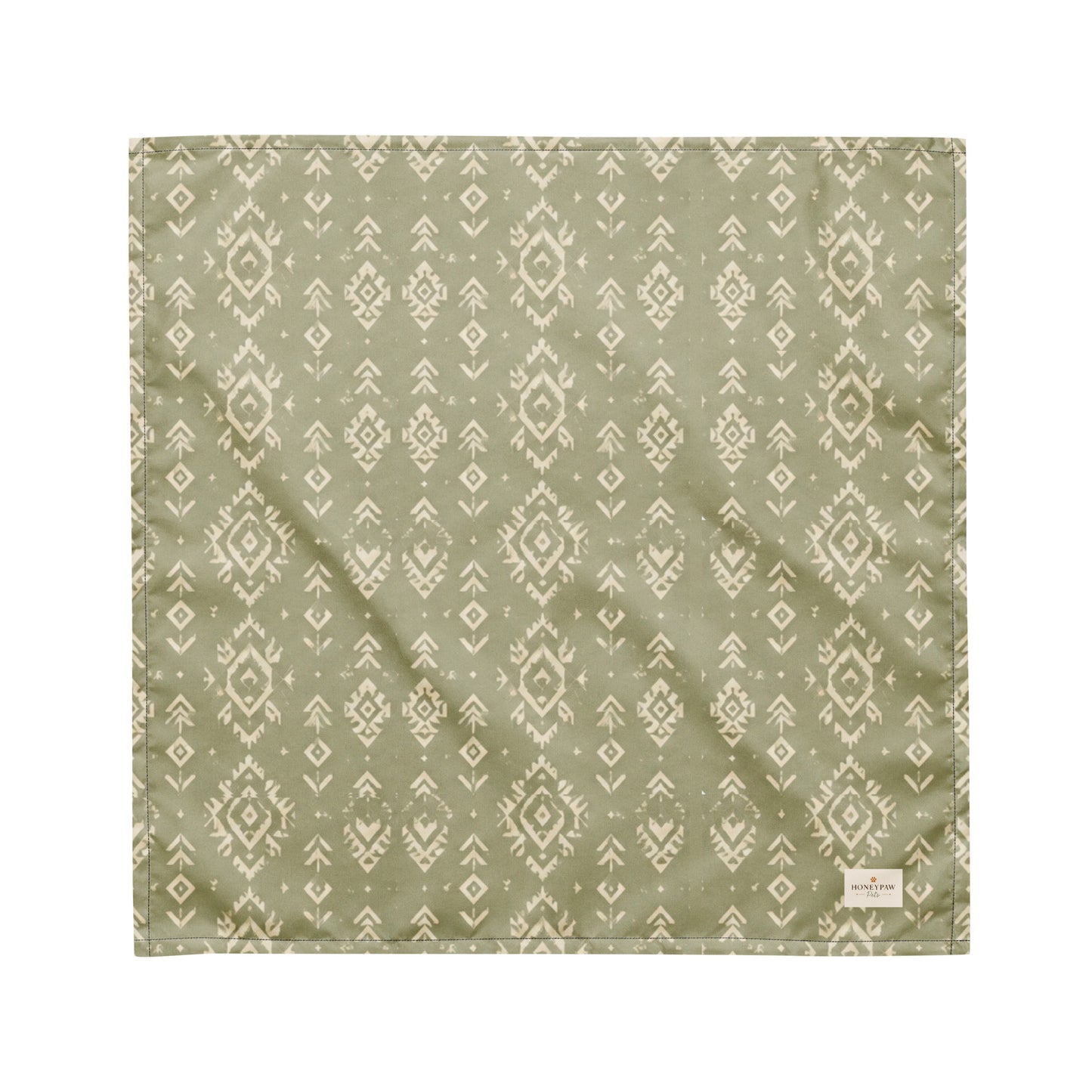 Juniper Trail dog bandana featuring a sage green background with a western-inspired geometric pattern in soft cream tones by HoneyPaw Pets.
