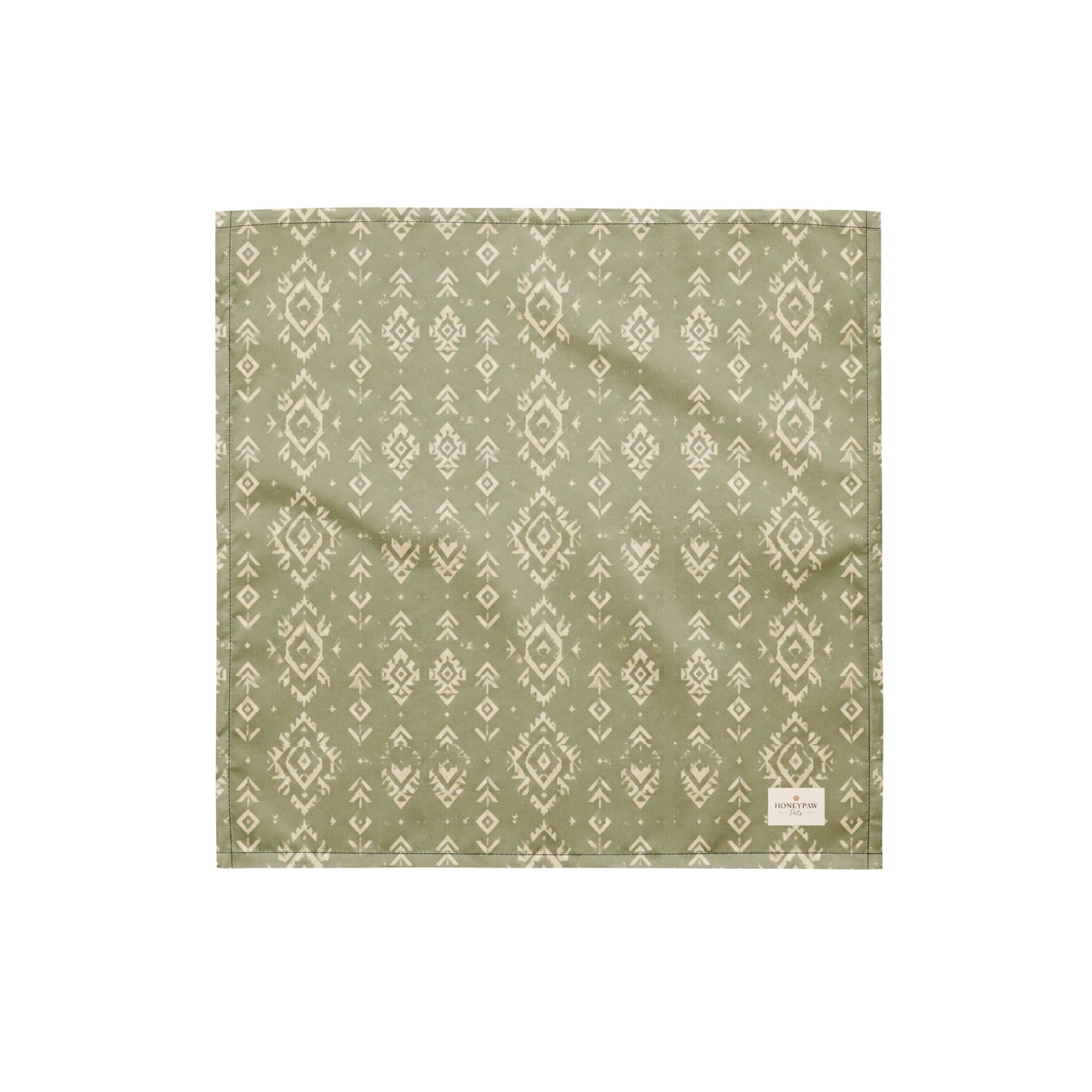 Juniper Trail dog bandana featuring a sage green background with a western-inspired geometric pattern in soft cream tones by HoneyPaw Pets.