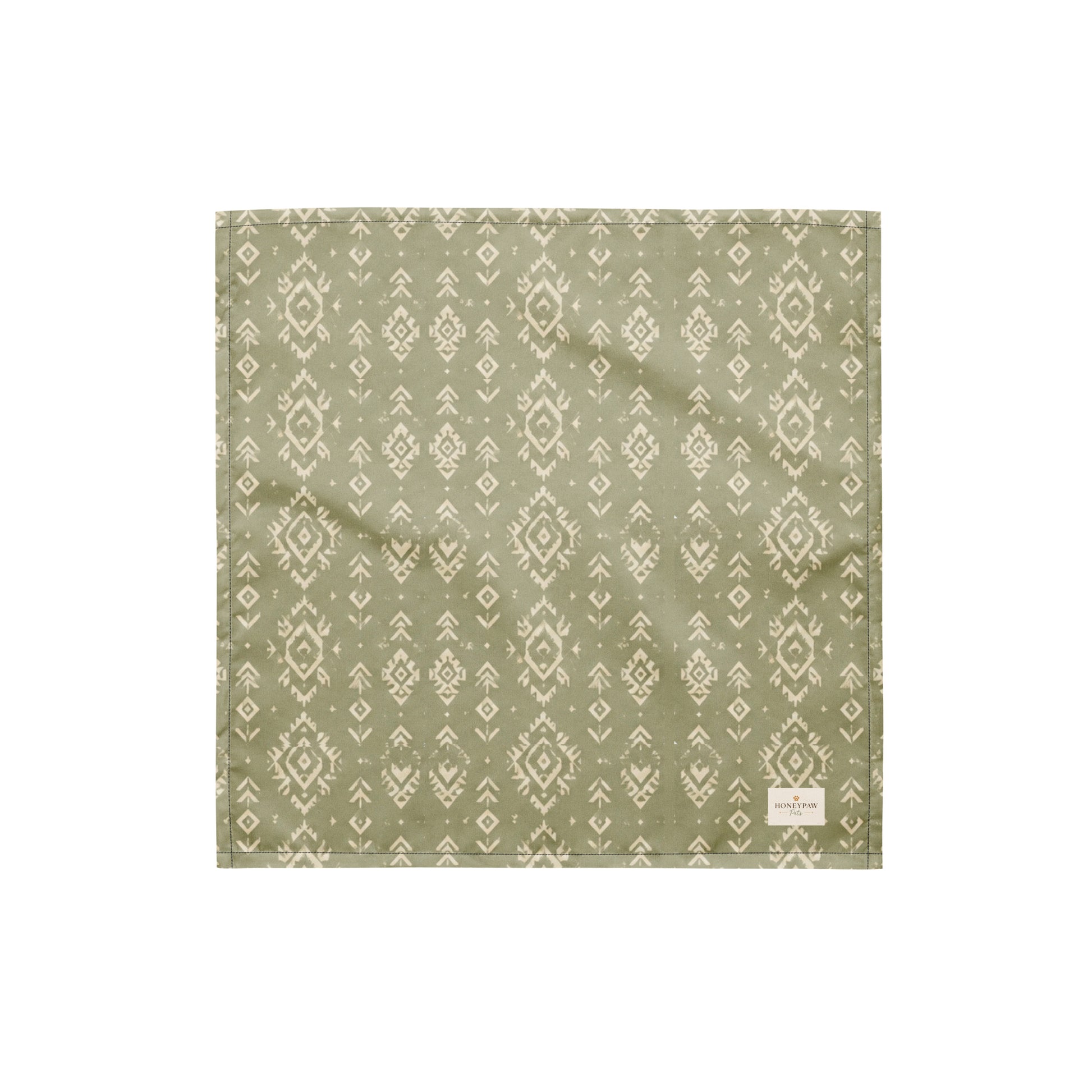 Juniper Trail dog bandana featuring a sage green background with a western-inspired geometric pattern in soft cream tones by HoneyPaw Pets.