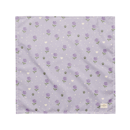 Lavendar Walks dog bandana featuring purple lavender flowers, paw prints, and white hearts on a soft lavender background by HoneyPaw Pets.