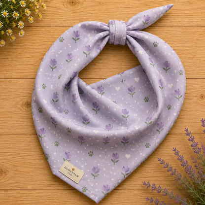 Lavendar Walks dog bandana featuring purple lavender flowers, paw prints, and white hearts on a soft lavender background by HoneyPaw Pets.
