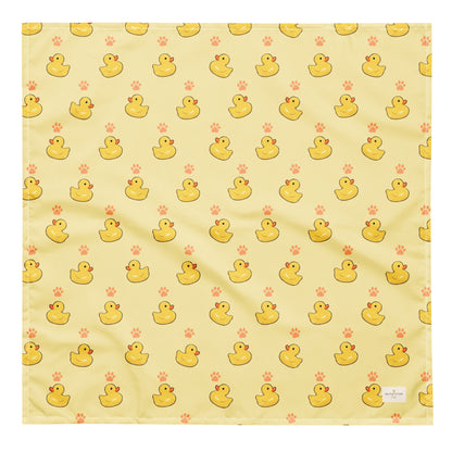 Lucky Duck dog bandana featuring rubber ducks and paw prints on a yellow background by HoneyPaw Pets