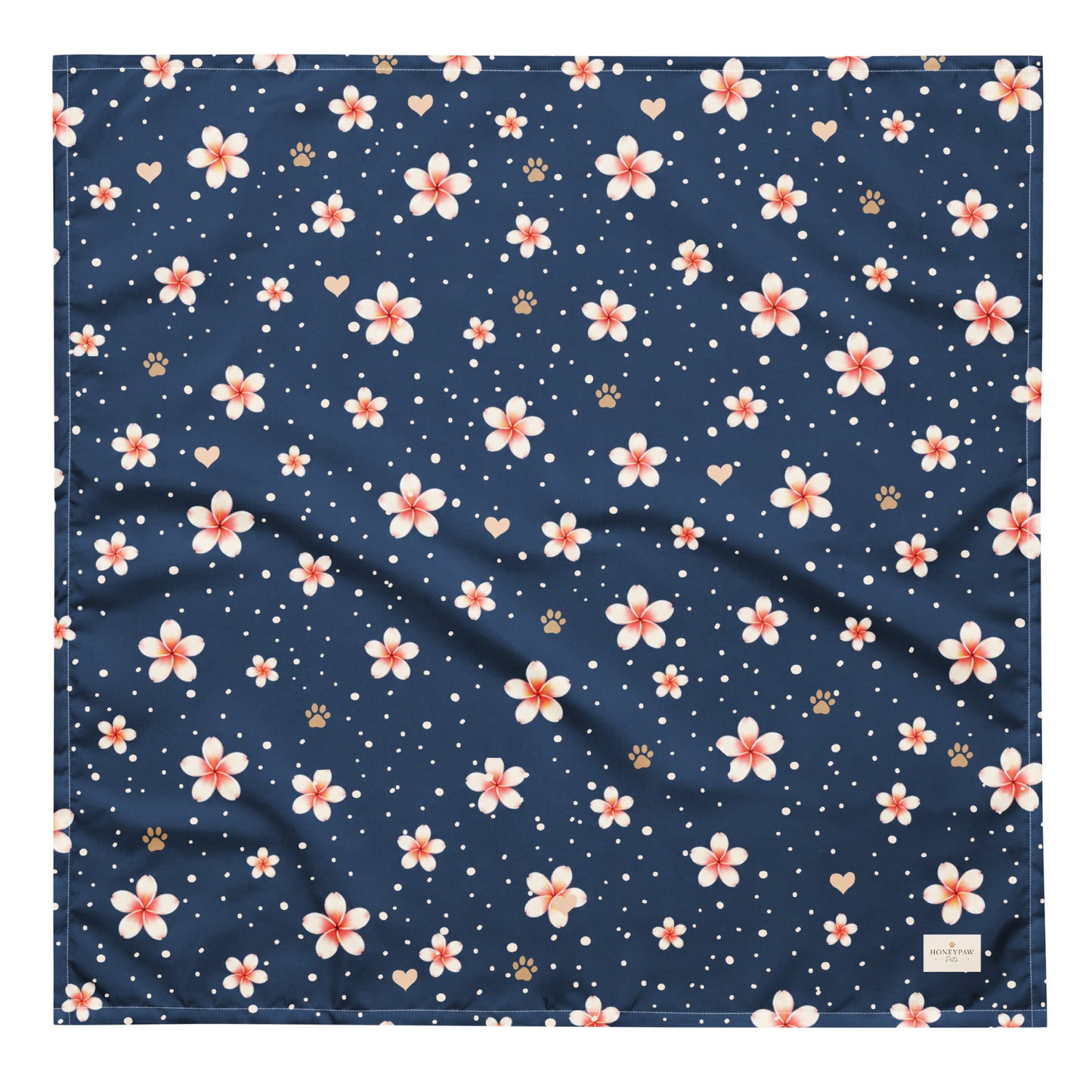 Moonlit Plumeria dog bandana featuring a white plumeria floral pattern on a navy blue background by HoneyPaw Pets.