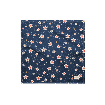 Moonlit Plumeria dog bandana featuring a white plumeria floral pattern on a navy blue background by HoneyPaw Pets.
