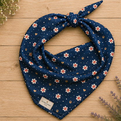 Moonlit Plumeria dog bandana featuring a white plumeria floral pattern on a navy blue background by HoneyPaw Pets.