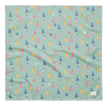 Party Animal birthday dog bandana featuring colorful party hats and paw prints on a mint green background by HoneyPaw Pets