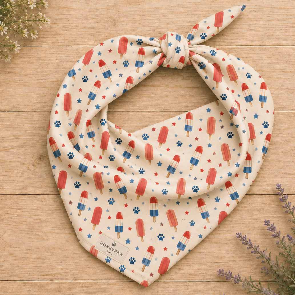 Popsicle Puppy dog bandana featuring a patriotic popsicle pattern on a cream background by HoneyPaw Pets.