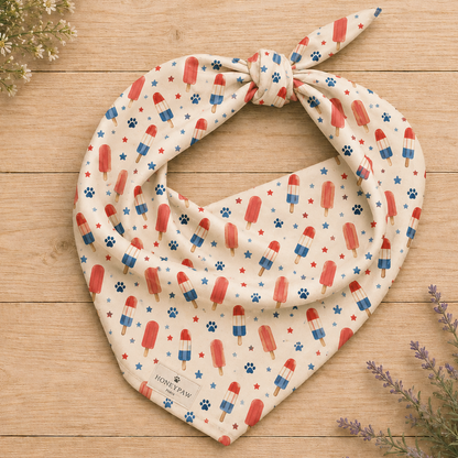 Popsicle Puppy dog bandana featuring a patriotic popsicle pattern on a cream background by HoneyPaw Pets.