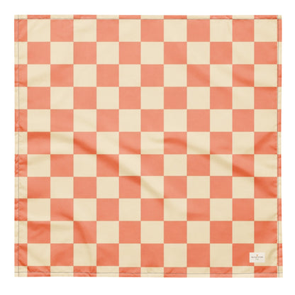 Pup Tart dog bandana featuring a coral pink and cream checkerboard pattern by HoneyPaw Pets.