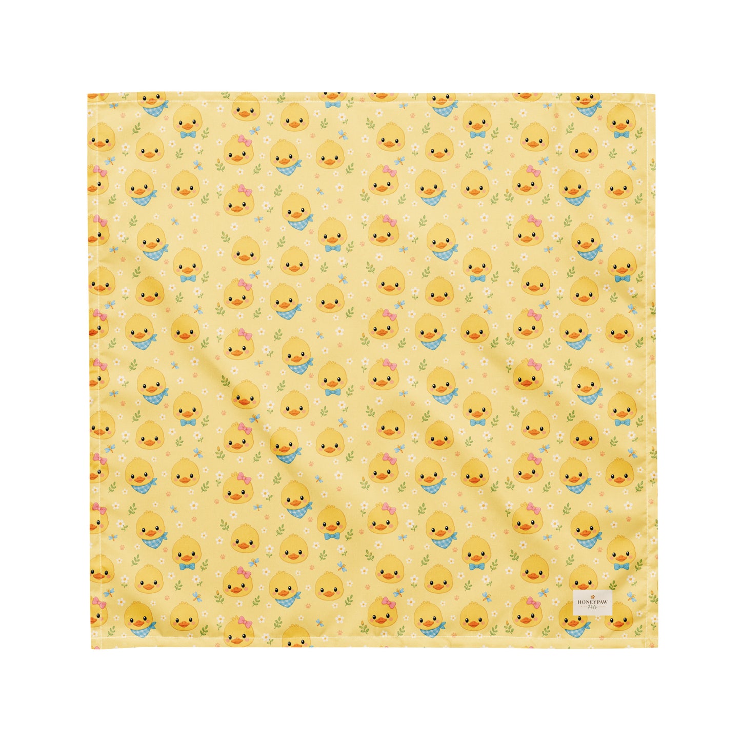 Quack Pack dog bandana featuring duck faces and paw prints on a yellow background by HoneyPaw Pets