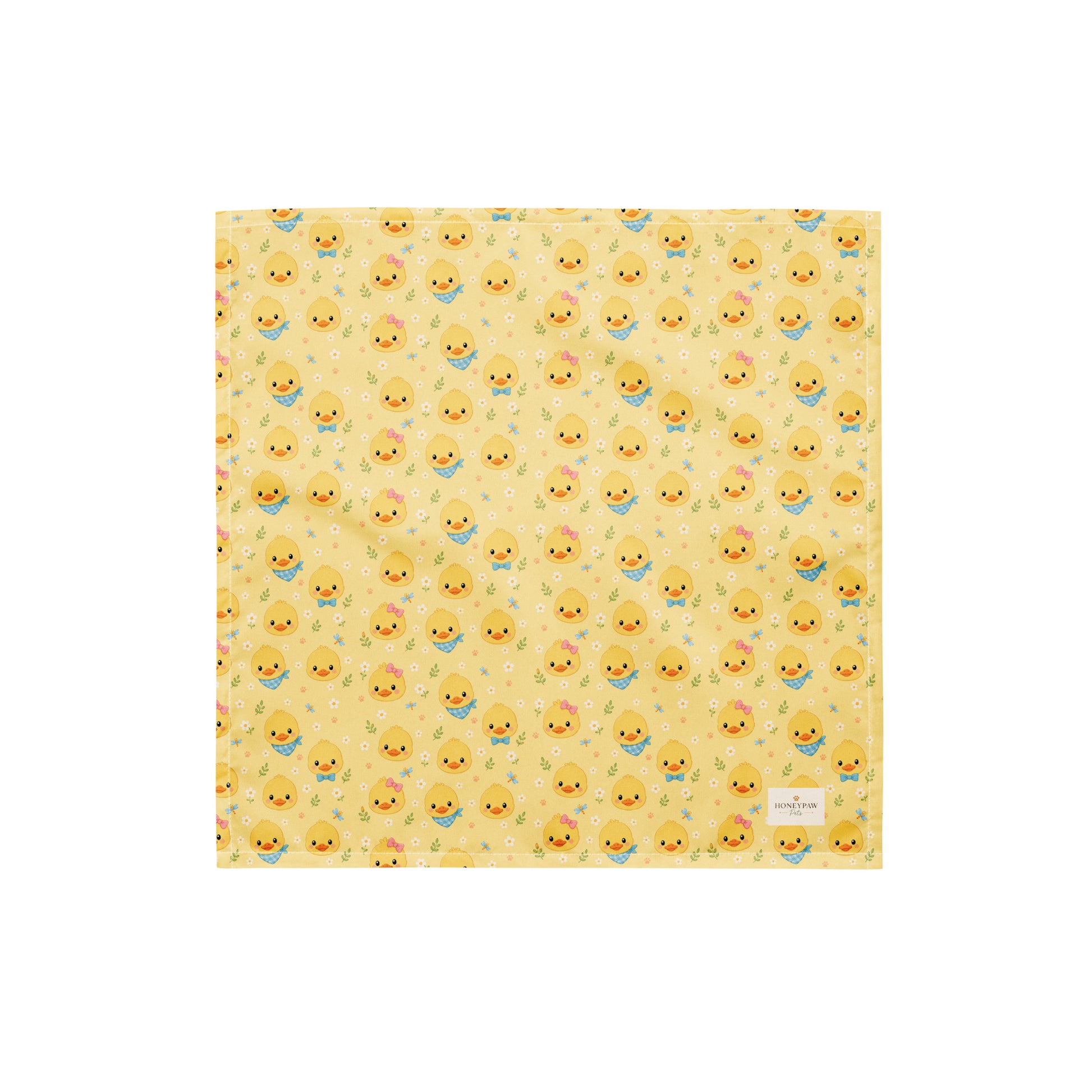 Quack Pack dog bandana featuring duck faces and paw prints on a yellow background by HoneyPaw Pets