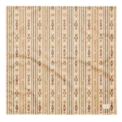 Rover Ranch dog bandana featuring a beige western stripe pattern with rustic floral accents in warm earth tones by HoneyPaw Pets.