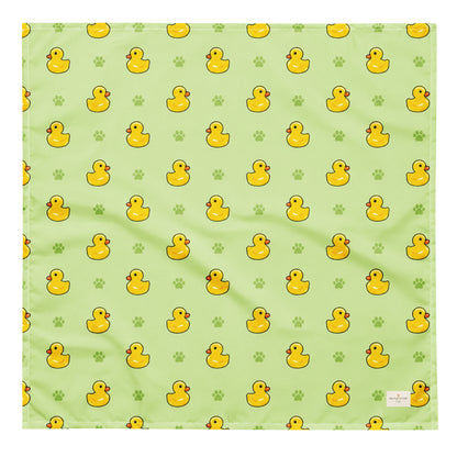 Rub-a-dub duck dog bandana featuring rubber ducks and paw prints on a green background by HoneyPaw Pets